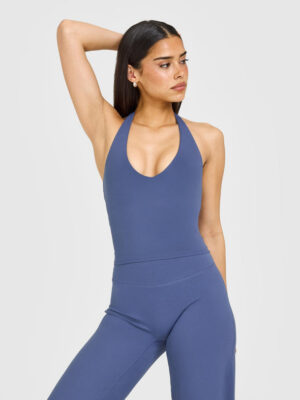 SOFTMOTION HALTER NECK MID VEST WITH BUILT IN BRA SHELF WITH WHITE LOGO