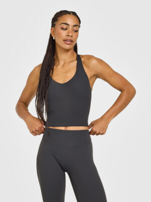 SOFTMOTION RACER BACK MID VEST WITH BUILT IN BRA SHELF WITH WHITE LOGO