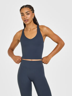 SOFTMOTION RACER BACK MID VEST WITH BUILT IN BRA SHELF WITH WHITE LOGO