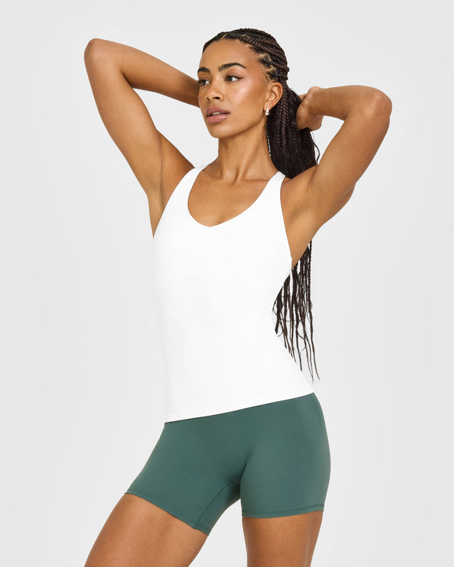 12DAYSONER_SOFTMOTION_RACER_BACK_MID_VEST_BUILT_IN_BRA_SHELF_WHITE_251105_PDP_1440x1800_01_650x.jpg