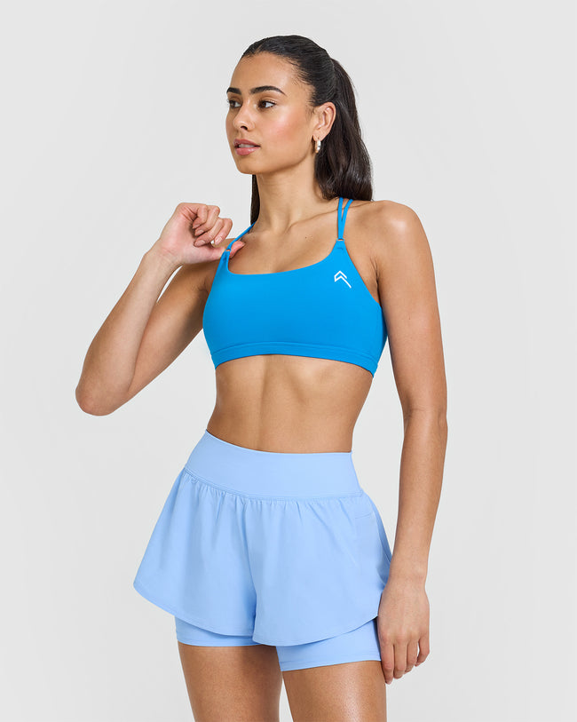 241206_SS25_EVERYDAY_CROSS_OVER_BRALETTE_TROPICALBLUE_PDP_1440x1800_01_650x.jpg