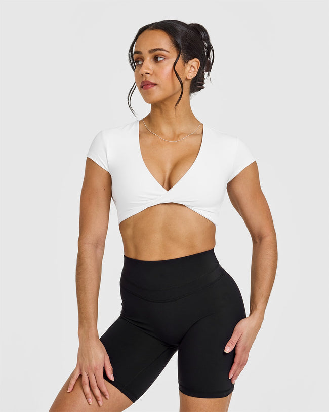 250106_VDAY_UNIFIED_TWIST_FRONT_SHORT_SLEEVE_CROP_TOP_WHITE_PDP_1440x1800_01_650x.jpg