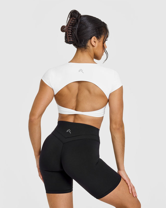 250106_VDAY_UNIFIED_TWIST_FRONT_SHORT_SLEEVE_CROP_TOP_WHITE_PDP_1440x1800_02_650x.jpg