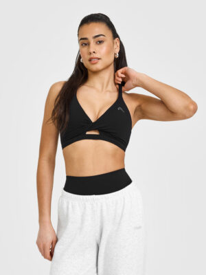 UNIFIED TWIST SPORTS BRA WHITE LOGO
