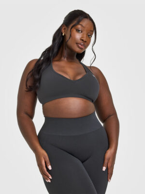 EFFORTLESS SEAMLESS RACER BACK SPORTS BRA WITH WHITE LOGO