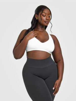 EFFORTLESS SEAMLESS RACER BACK SPORTS BRA WITH WHITE LOGO