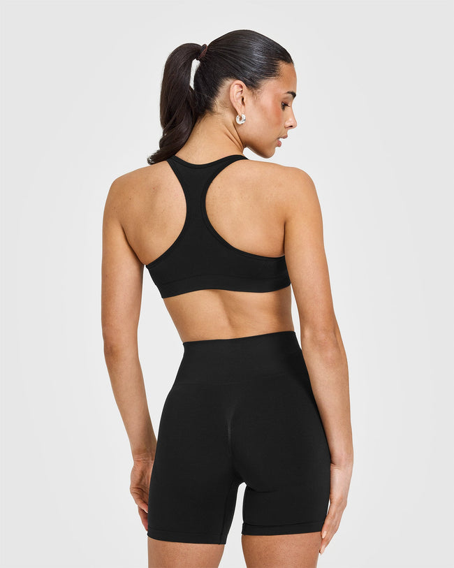 250227_STRONG_IS_A_STATEMENT_EFFORTLESS_SEAMLESS_RACER_BACK_SPORTS_BRA_BLACK_PDP_1440x1800_02_650x.jpg