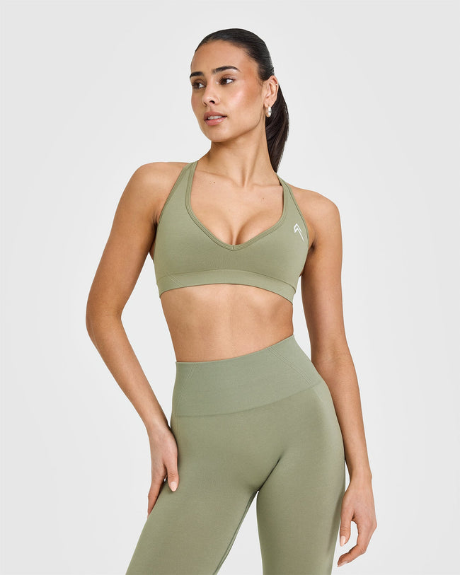 250227_STRONG_IS_A_STATEMENT_EFFORTLESS_SEAMLESS_RACER_BACK_SPORTS_BRA_DARKSAGEGREEN_PDP_1440x1800_01_650x.jpg