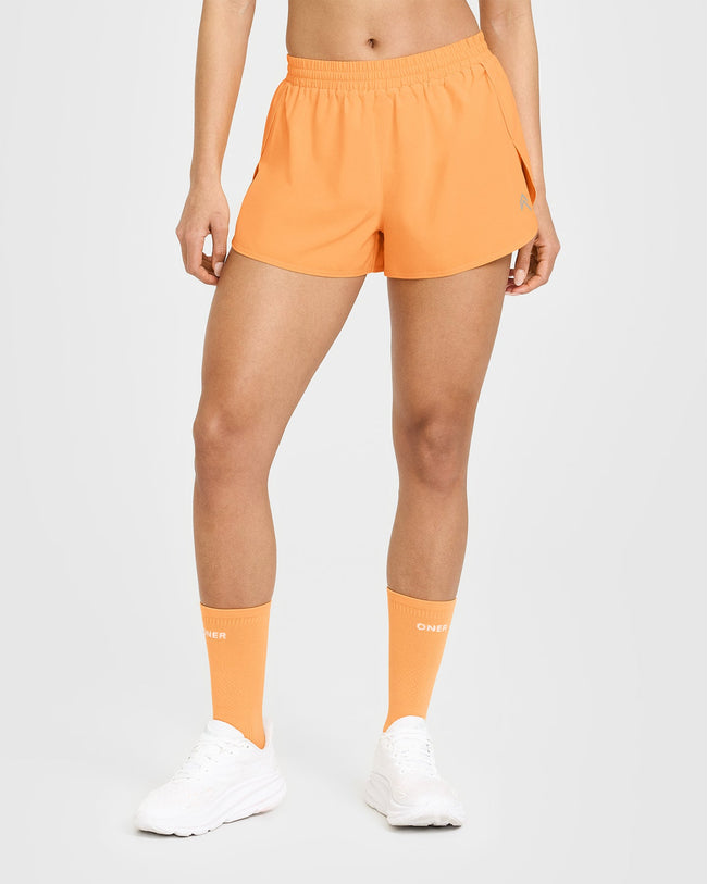 250409_HYBRID_AIRMOVE_SHORTS_POWDEREDORANGE_PDP_1440x1800_01_650x.jpg