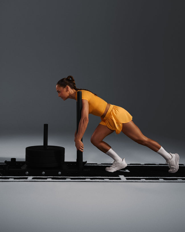 250409_HYBRID_AIRMOVE_SHORTS_POWDEREDORANGE_PDP_1440x1800_03_650x.jpg