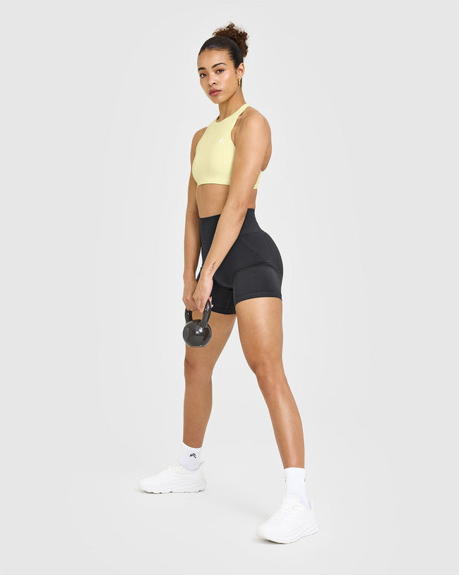 250409_HYBRID_EASYLIFT_HIGH_NECK_SPORTS_BRA_PASTELYELLOW_PDP_1440x1800_03_650x.jpg