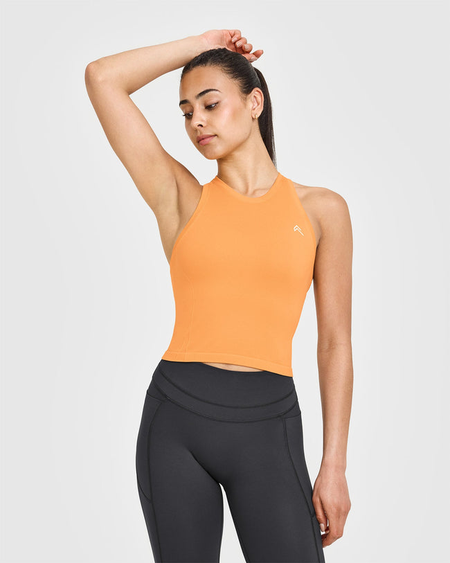 250410_HYBRID_GO_TO_SEAMLESS_FITTED_HIGH_NECK_MID_VEST_POWDEREDORANGE_PDP_1440x1800_01_650x.jpg