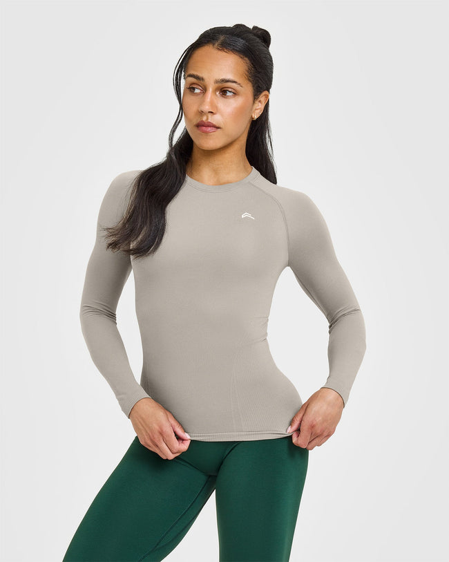 250414_SUMMERSEASONAL_GO_TO_SEAMLESS_FITTED_LONG_SLEEVE_TOP_WARMSAND_PDP_1440x1800_01_650x.jpg