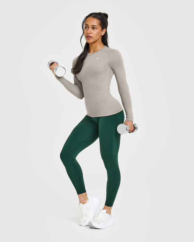 250414_SUMMERSEASONAL_GO_TO_SEAMLESS_FITTED_LONG_SLEEVE_TOP_WARMSAND_PDP_1440x1800_03_650x.jpg