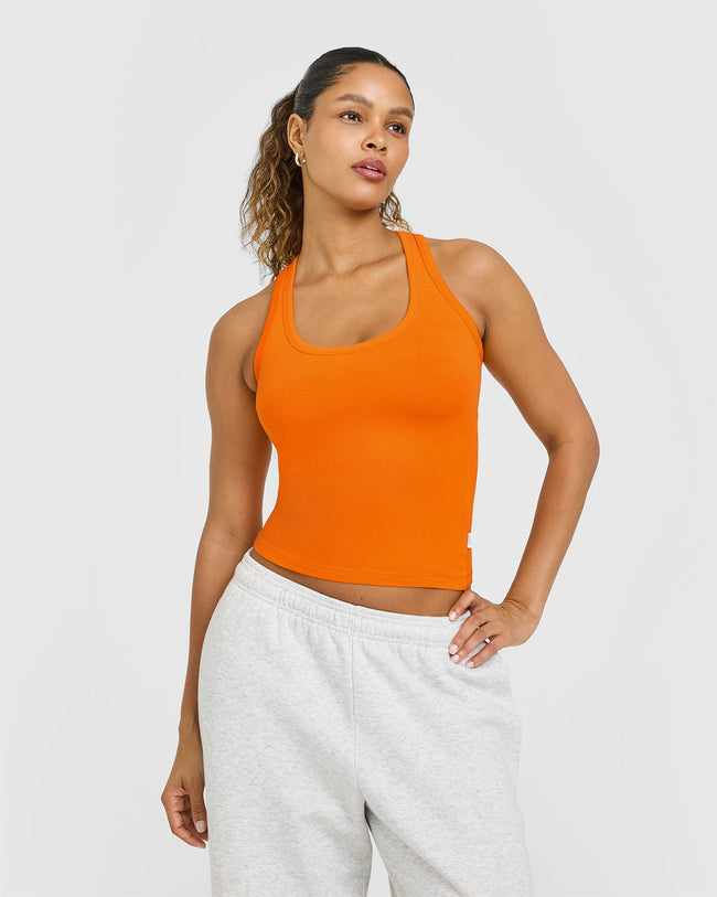 BAU_BRIGHTS_COTTON_FITTED_VEST_FLAMEORANGE_250813_PDP_1440x1800_01_13065ab4-96c7-421d-8cae-ca3e3987defb_650x.jpg
