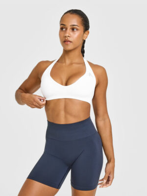 EFFORTLESS SEAMLESS HALTER NECK SPORTS BRA WITH WHITE LOGO