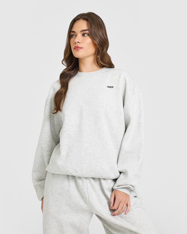 BAU_FOUNDATIONS_CREW_NECK_SWEATSHIRT_LIGHTGREYMARL_250827_PDP_1440x1800_01_650x.jpg