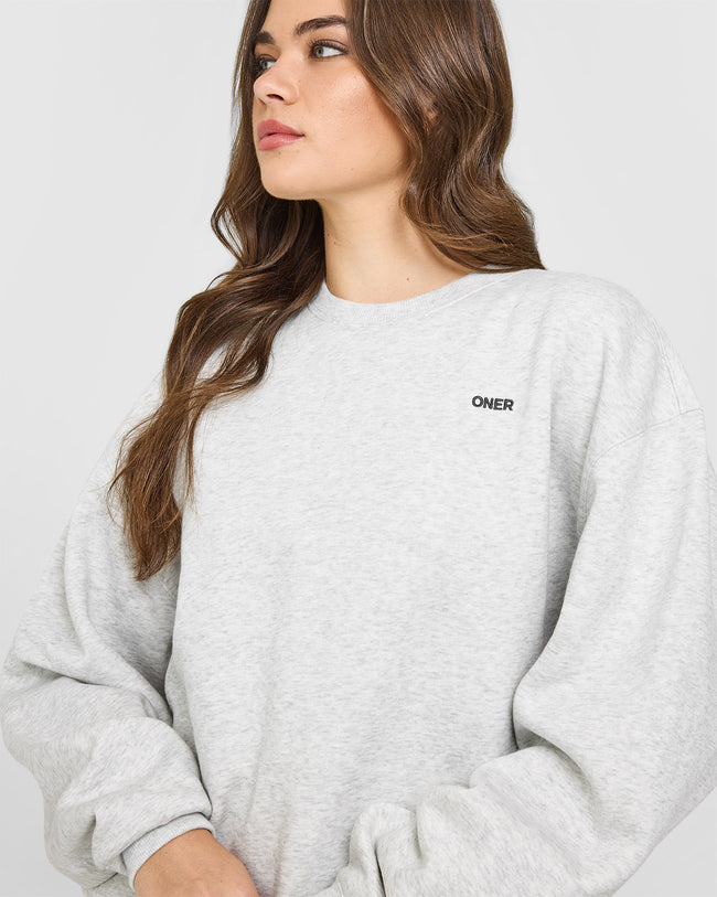 BAU_FOUNDATIONS_CREW_NECK_SWEATSHIRT_LIGHTGREYMARL_250827_PDP_1440x1800_05_650x.jpg