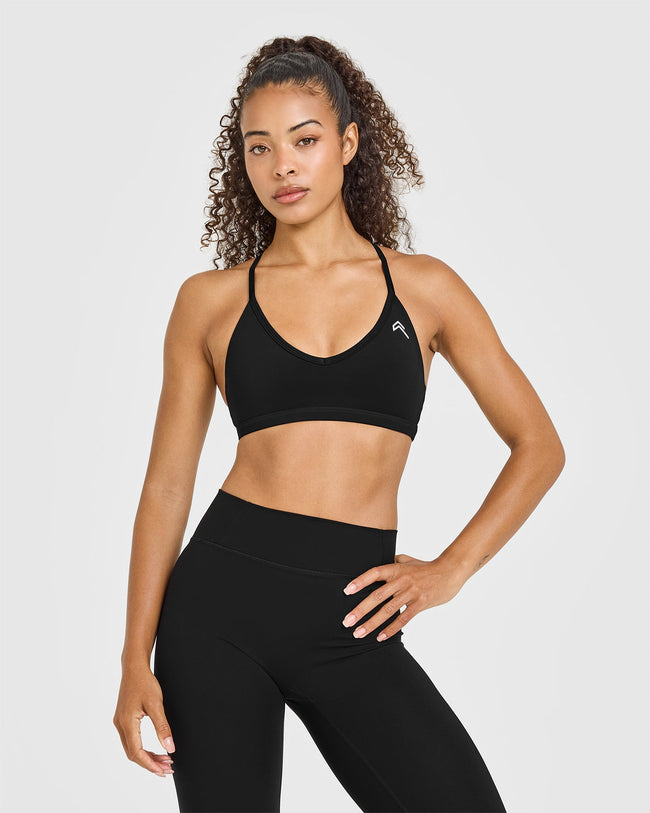 BAU_TIMELESS_STRAPPY_BRALETTE_WHITE_LOGO_BLACK_250714_PDP_1440x1800_01_650x.jpg