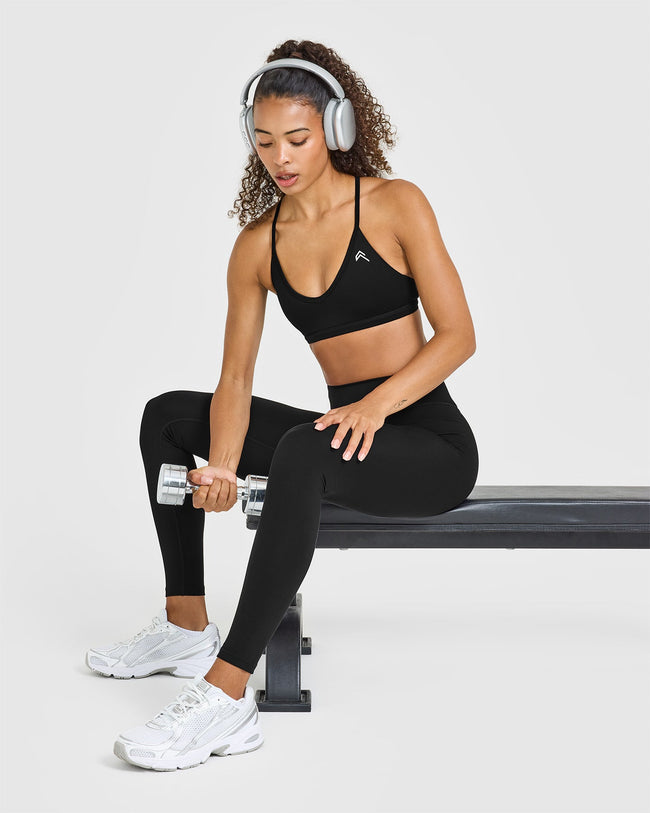 BAU_TIMELESS_STRAPPY_BRALETTE_WHITE_LOGO_BLACK_250714_PDP_1440x1800_03_650x.jpg