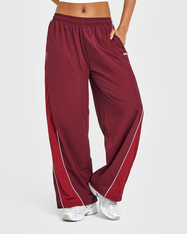 LIFESTYLE_BAU_OVERSIZED_PIPED_WOVEN_STRAIGHT_LEG_TRACK_BOTTOMS_ROSEWOOD_250728_PDP_1440x1800_01_650x.jpg