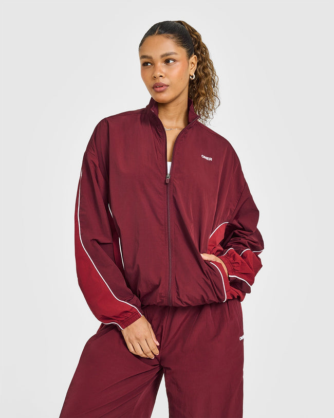 LIFESTYLE_BAU_OVERSIZED_PIPED_WOVEN_TRACK_JACKET_ROSEWOOD_250728_PDP_1440x1800_01_650x.jpg