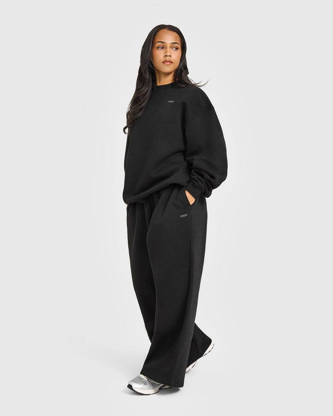 NOOS_FOUNDATIONS_OVERSIZED_JOGGER_BLACK_250820_PDP_1440x1800_03_a22cef45-deca-4231-8d2f-9fdaae3ccce4_650x.jpg