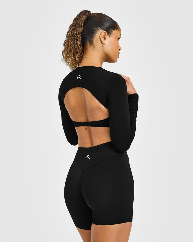 NOOS_UNIFIED_TWIST_FRONT_LONG_SLEEVE_CROP_TOP_BLACK_250728_PDP_1440x1800_02_650x.jpg