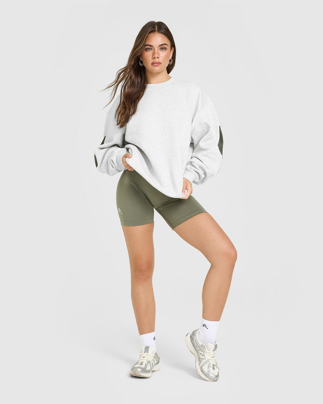 OA_X_BRENDA_FOUNDATIONS_OVERSIZED_CREW_NECK_SWEATSHIRT_LIGHTGREYMARL_250805_PDP_1440x1800_03_650x.jpg