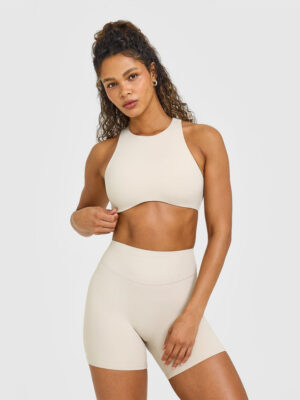 SOFTMOTION HIGH NECK SPORTS BRA WITH WHITE LOGO