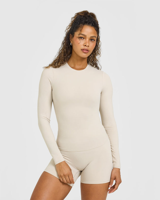 OUTDOOR_ACTIVE_REST_DAY_SOFTMOTION_LONG_SLEEVE_TOP_SAND_250828_PDP_1440x1800_01_650x.jpg