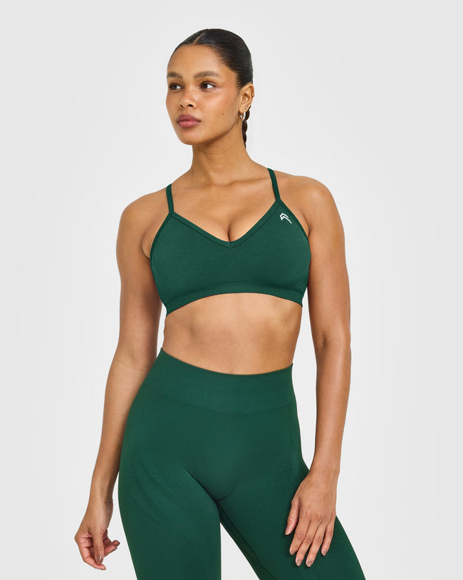 WINTER_SEASONAL_ENHANCELIFT_SEAMLESS_STRAPPY_SPORTS_BRA_DARKRACINGGREEN_250916_PDP_1440x1800_01_7ca5be22-5647-40b1-9388-7d8f7ab25877_650x.jpg