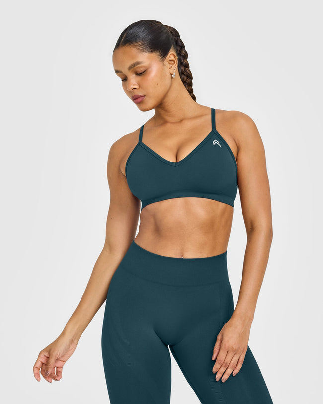WINTER_SEASONAL_ENHANCELIFT_SEAMLESS_STRAPPY_SPORTS_BRA_OILBLUE_250916_PDP_1440x1800_01_158a1439-e97e-4f35-b11b-b8c09d415f9d_650x.jpg