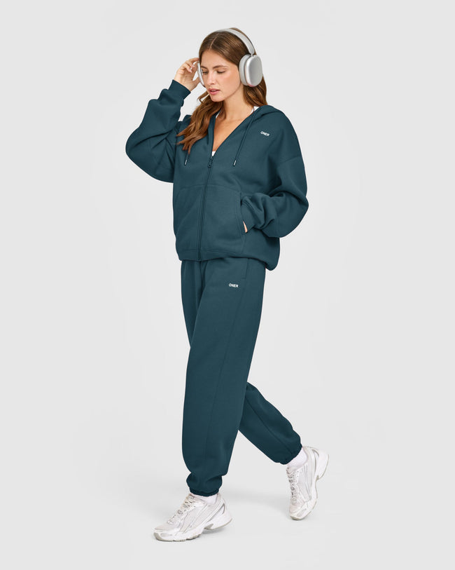 WINTER_SEASONAL_FOUNDATIONS_ZIP_THROUGH_HOODIE_OILBLUE_250915_PDP_1440x1800_03_b560a0e9-62e0-469f-a2b5-c6cbe8525c8e_650x.jpg