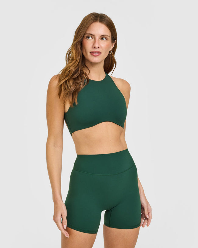 WINTER_SEASONAL_SOFTMOTION_HIGH_NECK_SPORTS_BRA_DARKRACINGGREEN_250915_PDP_1440x1800_01_1778c61c-6a1a-4f54-9e10-fa8619f60ce6_650x.jpg